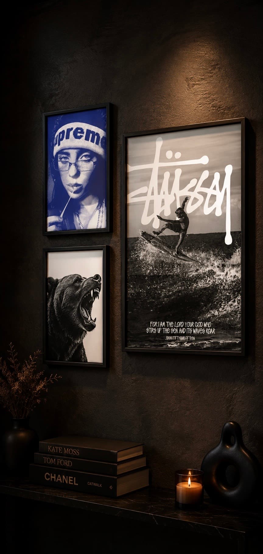 Three framed wall-art posters displayed on a dark textured gallery wall